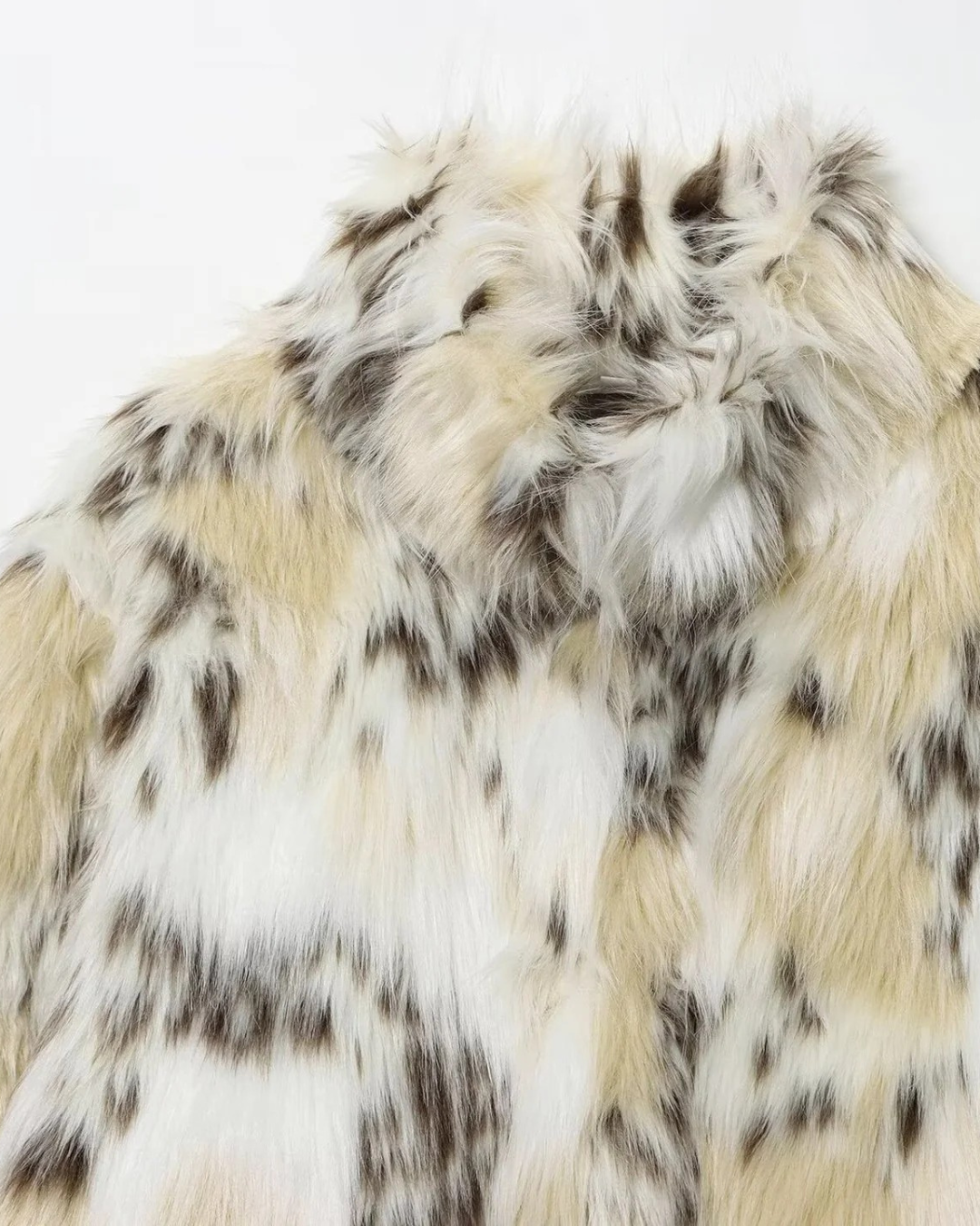 KORTE FAUX FUR JAS - GEVLEKT