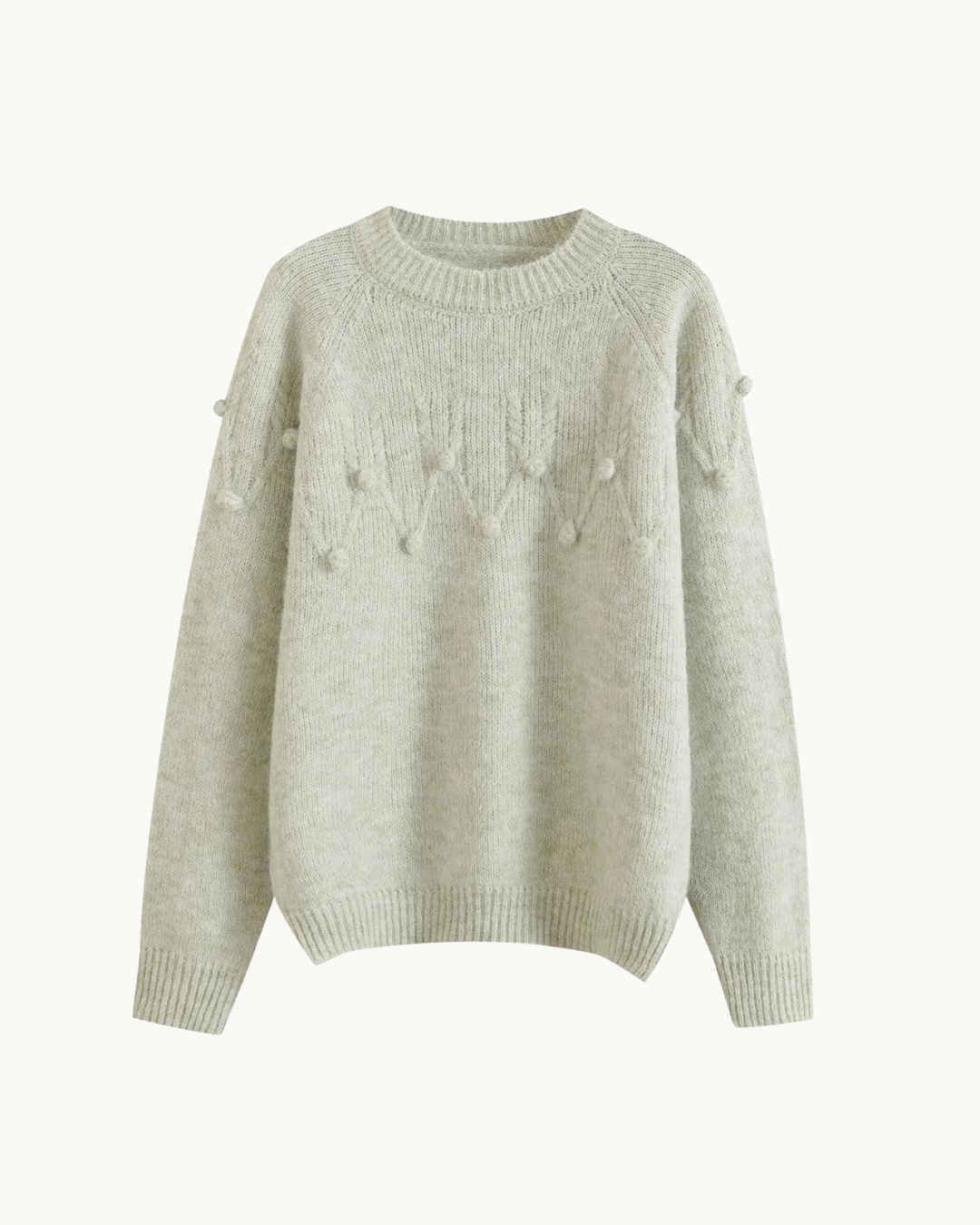 ELEGANTE SWEATER MET POMPONS