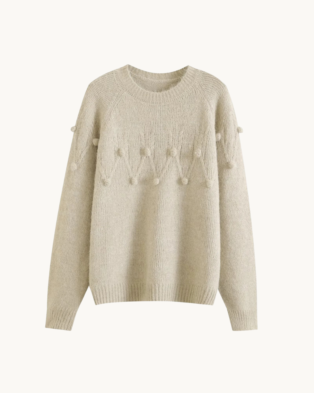 ELEGANTE SWEATER MET POMPONS