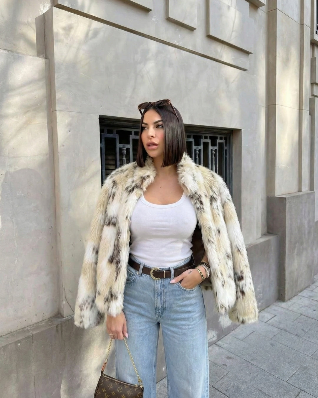 KORTE FAUX FUR JAS - GEVLEKT