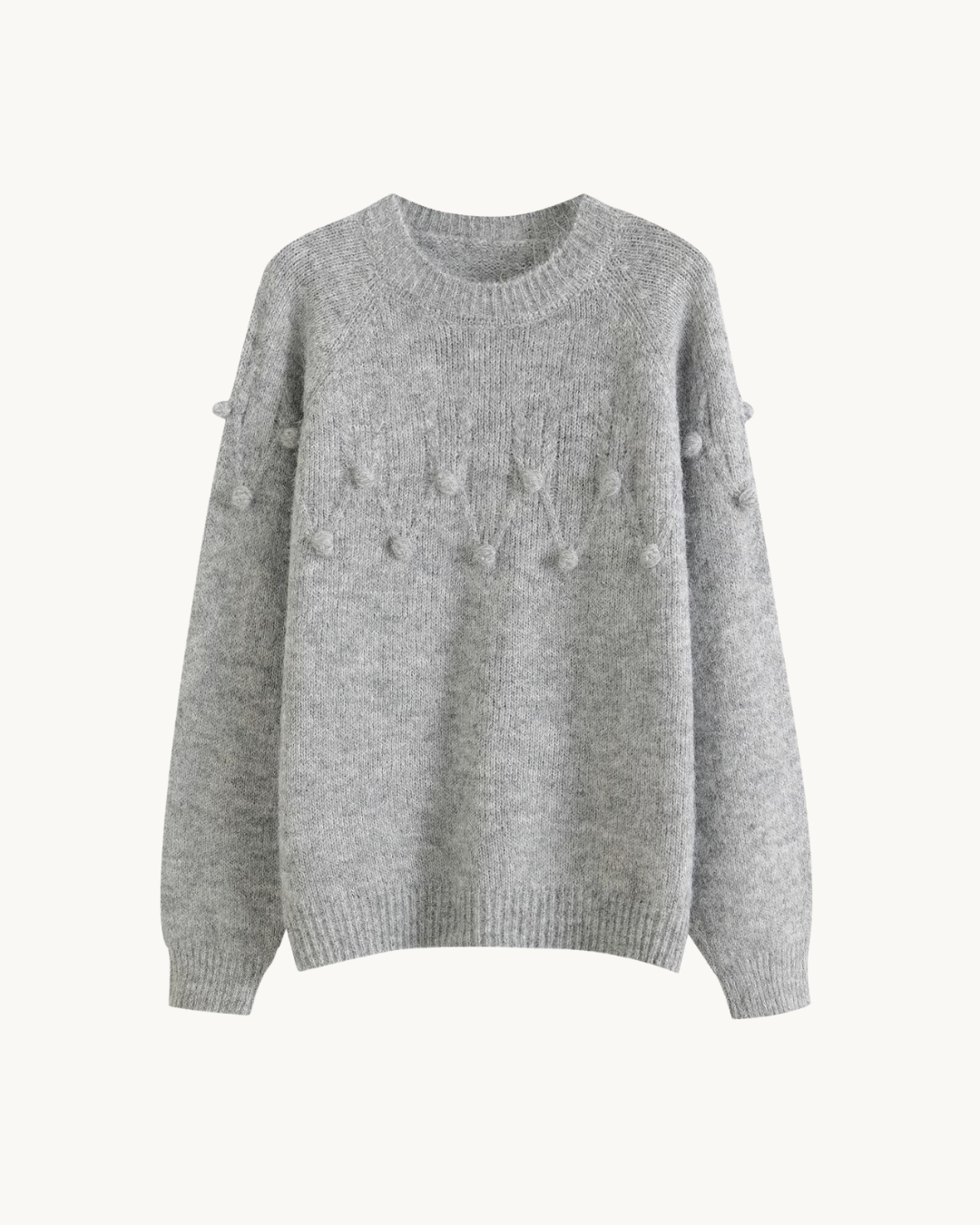ELEGANTE SWEATER MET POMPONS